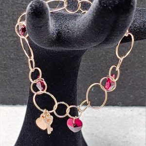 Bracciale a catena tonda alternata con charms in Ag925 placcato rose gold e cristalli Swarovski