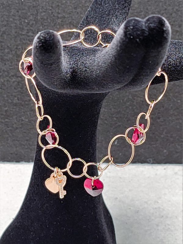 Bracciale a catena tonda alternata con charms in Ag925 placcato rose gold e cristalli Swarovski