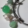 Bracciale rigido con cristallo, perla d'acqua dolce, pietre dure e charms