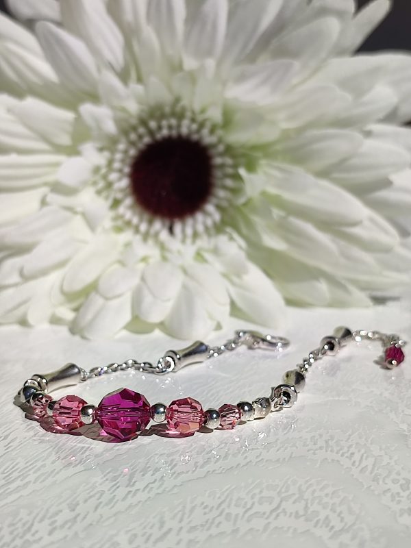 Bracciale in metallo anallergico con inserti in acciaio e cristalli Swarovski
